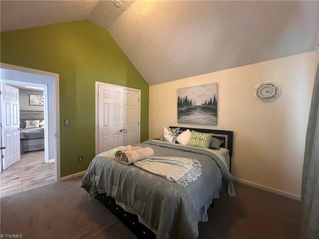 5227 Eagle Creek Dr, Charlotte, NC 28269 - bedroom with vaulted ceiling, carpet floors, baseboards, and a closet