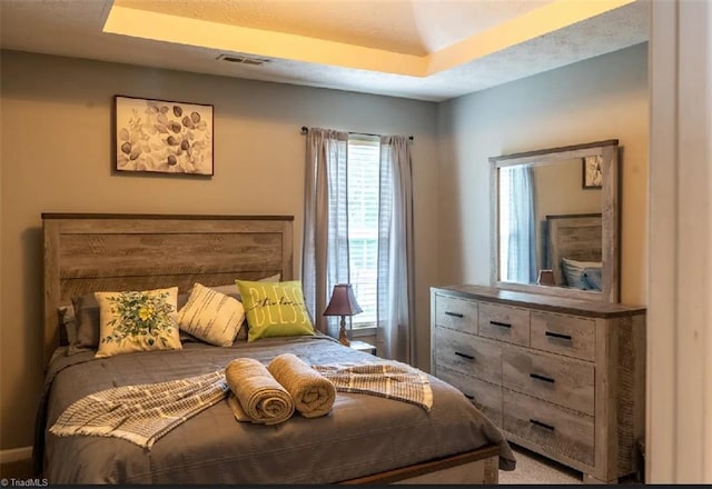 5227 Eagle Creek Dr, Charlotte, NC 28269 - bedroom featuring a tray ceiling