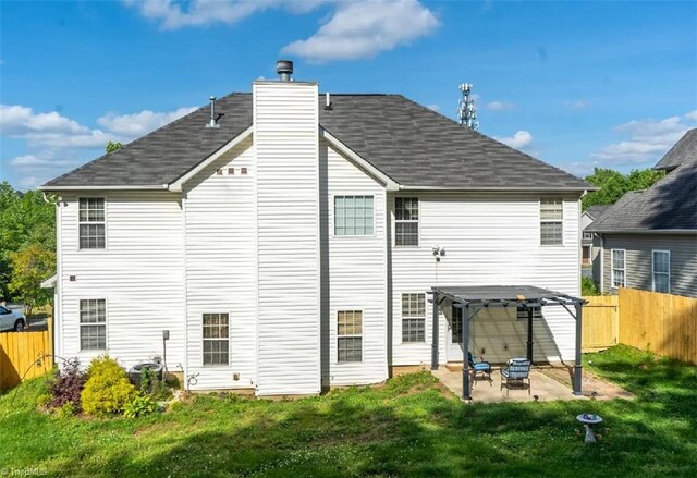 5227 Eagle Creek Dr, Charlotte, NC 28269 - rear view of property with a patio, a chimney, and a shingled roof