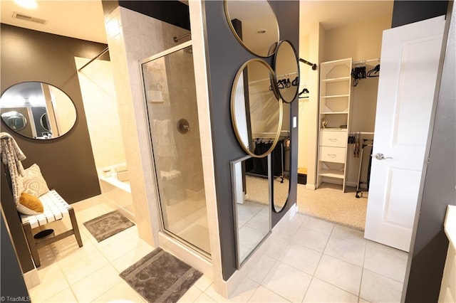 bathroom with tile patterned flooring and plus walk in shower