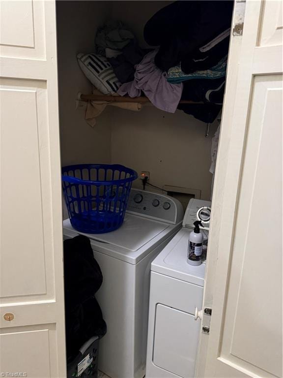 laundry area featuring independent washer and dryer