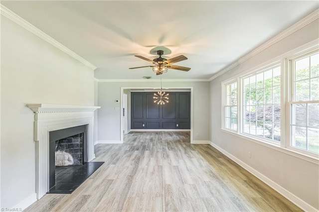 unfurnished living room with wood finished floors, baseboards, ceiling fan, crown molding, and a fireplace with raised hearth