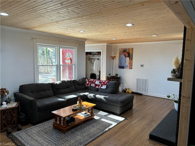 living room featuring ornamental molding, hardwood / wood-style floors, and wooden ceiling