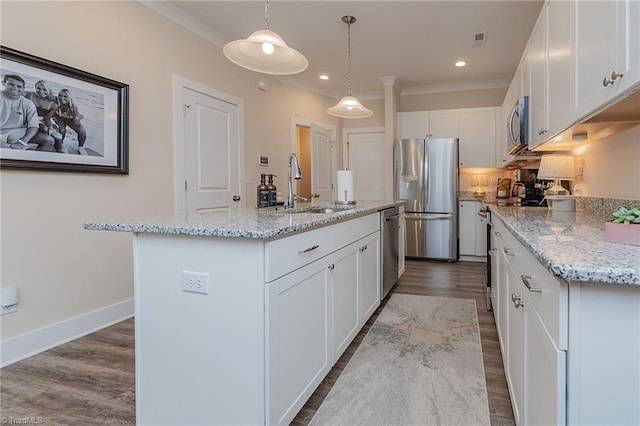 kitchen featuring white cabinetry, dark wood-type flooring, appliances with stainless steel finishes, and a sink