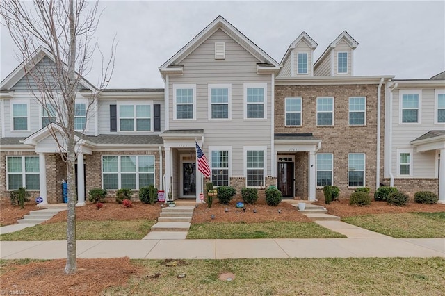 multi unit property with brick siding