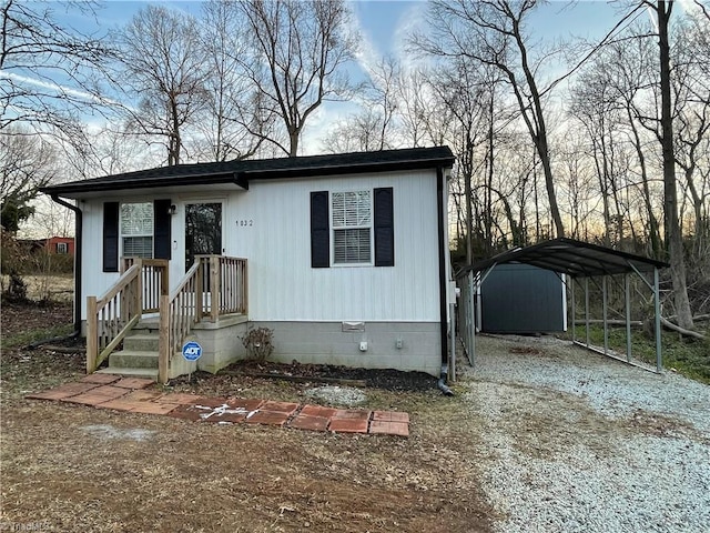 view of front of house with a carport