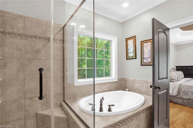 7821 Charles Place Dr, Kernersville, NC 27284 - full bath featuring ensuite bath, a bath, a stall shower, wood finished floors, and ornamental molding