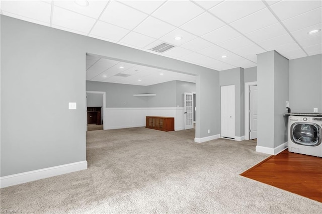7821 Charles Place Dr, Kernersville, NC 27284 - unfurnished living room featuring washer / clothes dryer, carpet floors, a paneled ceiling, and recessed lighting