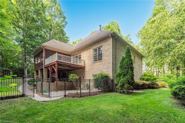 7821 Charles Place Dr, Kernersville, NC 27284 - rear view of house with a patio area, brick siding, and a sunroom