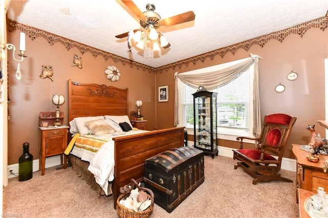 bedroom featuring carpet flooring and ceiling fan