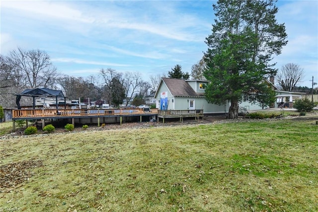 view of yard with a deck