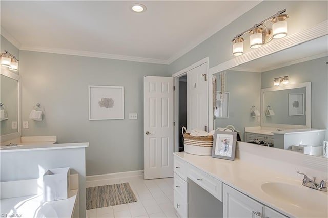 bathroom with tile patterned floors, vanity, crown molding, and baseboards