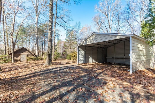 view of outdoor structure with a carport