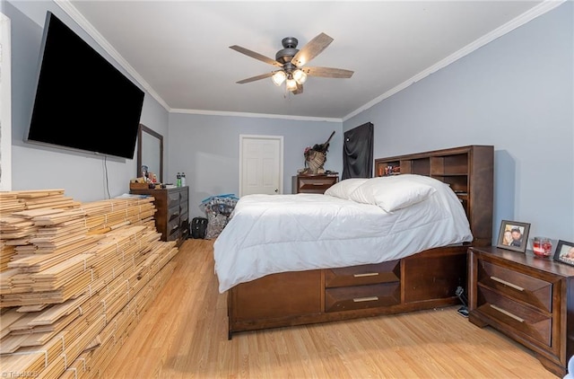 1414 Henri St, Mount Airy, NC 27030 - bedroom with light wood finished floors, ornamental molding, and ceiling fan