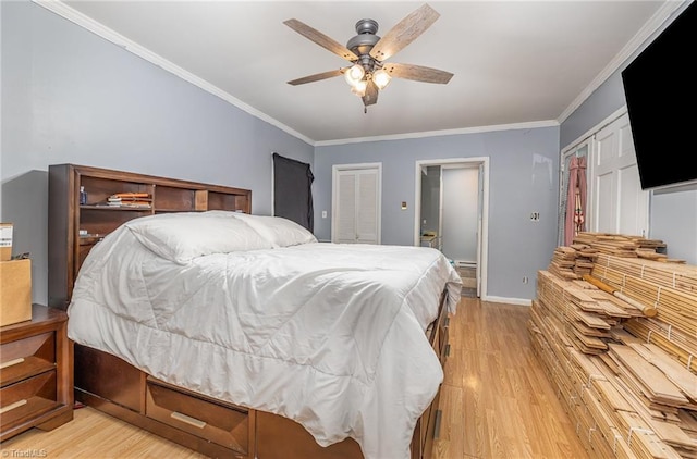 1414 Henri St, Mount Airy, NC 27030 - bedroom with light wood-style flooring, ornamental molding, baseboards, and ceiling fan