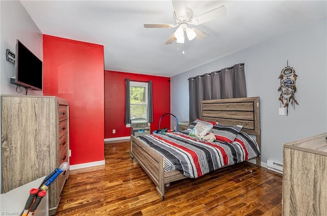 1414 Henri St, Mount Airy, NC 27030 - bedroom featuring wood finished floors, baseboard heating, and baseboards