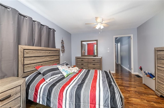 1414 Henri St, Mount Airy, NC 27030 - bedroom featuring dark wood-style flooring, baseboards, and ceiling fan