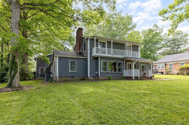 1414 Henri St, Mount Airy, NC 27030 - back of house with a porch, a chimney, central AC unit, a lawn, and crawl space