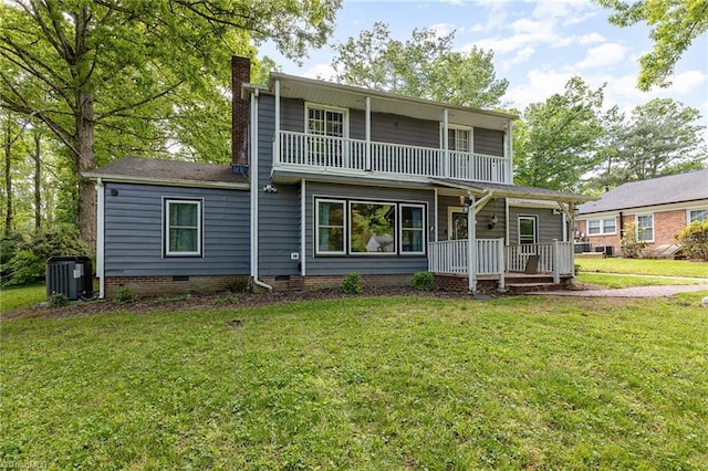1414 Henri St, Mount Airy, NC 27030 - rear view of property with a porch, central AC, a chimney, a balcony, and a lawn