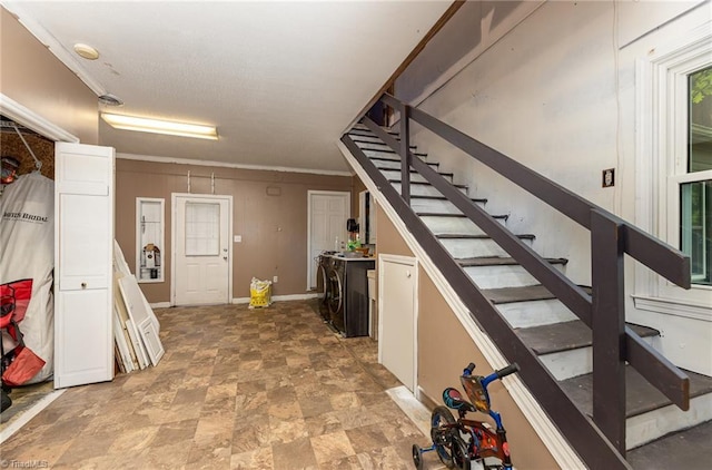 1414 Henri St, Mount Airy, NC 27030 - basement featuring separate washer and dryer, stone finish floors, stairway, ornamental molding, and baseboards