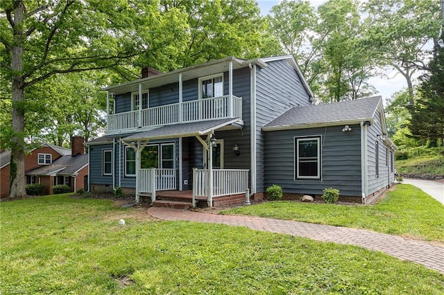 1414 Henri St, Mount Airy, NC 27030 - view of front of property with a balcony, a porch, a front yard, and a chimney