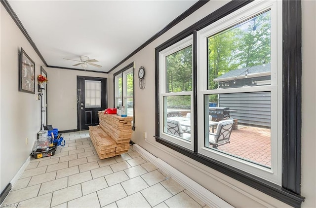 1414 Henri St, Mount Airy, NC 27030 - sunroom with crown molding, baseboards, and tile patterned flooring