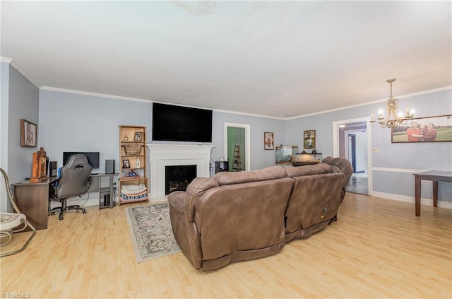 1414 Henri St, Mount Airy, NC 27030 - living area featuring wood finished floors, a chandelier, a desk, ornamental molding, and a fireplace