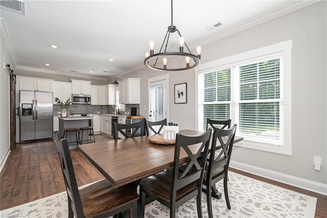 7634 Grapevine Rd, Lewisville, NC 27023 - dining area with visible vents, baseboards, plenty of natural light, and a notable chandelier