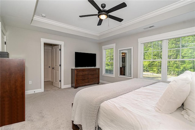 7634 Grapevine Rd, Lewisville, NC 27023 - bedroom featuring crown molding, a raised ceiling, baseboards, and light carpet