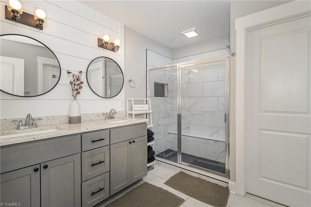 7634 Grapevine Rd, Lewisville, NC 27023 - bathroom featuring a sink, a marble finish shower, tile patterned flooring, and double vanity