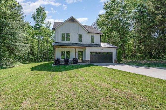 7634 Grapevine Rd, Lewisville, NC 27023 - modern farmhouse style home with board and batten siding, a standing seam roof, driveway, a front yard, and an attached garage