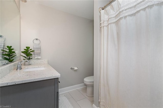 7634 Grapevine Rd, Lewisville, NC 27023 - bathroom with vanity, tile patterned flooring, baseboards, and toilet
