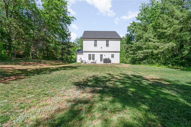 7634 Grapevine Rd, Lewisville, NC 27023 - back of house with a yard