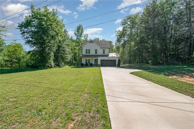 7634 Grapevine Rd, Lewisville, NC 27023 - view of front facade with an attached garage, driveway, and a front lawn