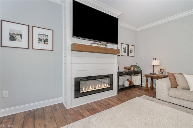 7634 Grapevine Rd, Lewisville, NC 27023 - living room featuring a large fireplace, baseboards, ornamental molding, and wood finished floors
