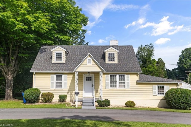 3231 Arlington Dr, Winston-Salem, NC 27103 - cape cod-style house with a shingled roof and a chimney