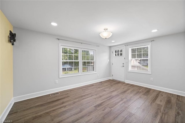 3231 Arlington Dr, Winston-Salem, NC 27103 - foyer with dark wood finished floors, plenty of natural light, and recessed lighting