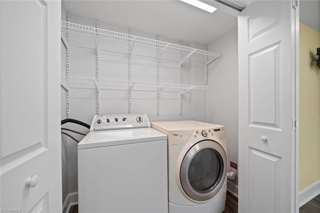 3231 Arlington Dr, Winston-Salem, NC 27103 - washroom with separate washer and dryer and wood finished floors