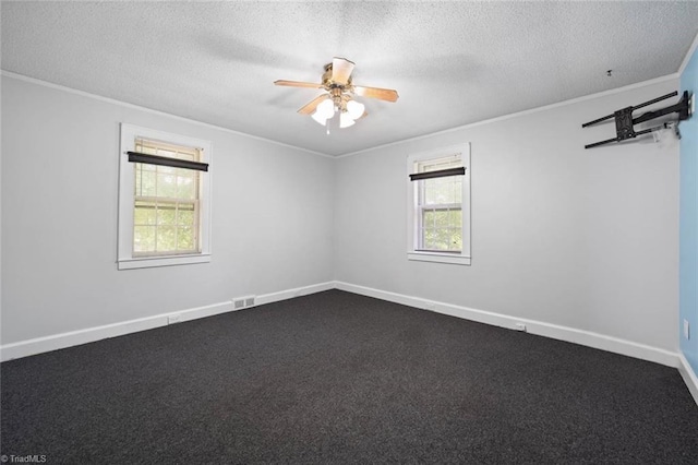3231 Arlington Dr, Winston-Salem, NC 27103 - spare room with crown molding, a ceiling fan, a textured ceiling, and dark carpet