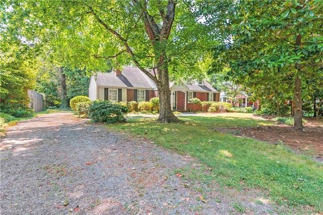 view of front of home with a front lawn