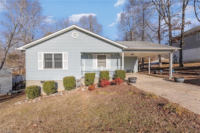 view of front of home featuring a carport and a porch