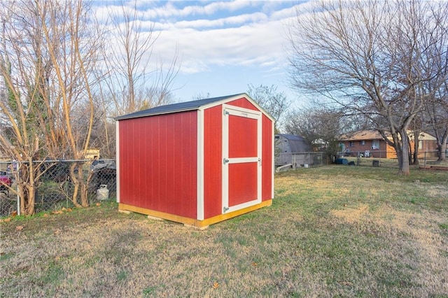 view of outdoor structure with a lawn