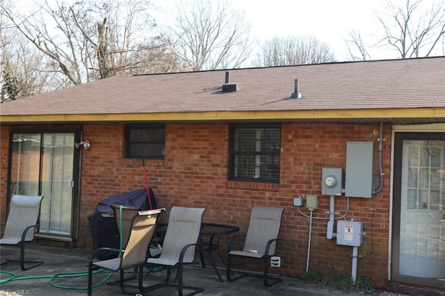 back of property with a patio area