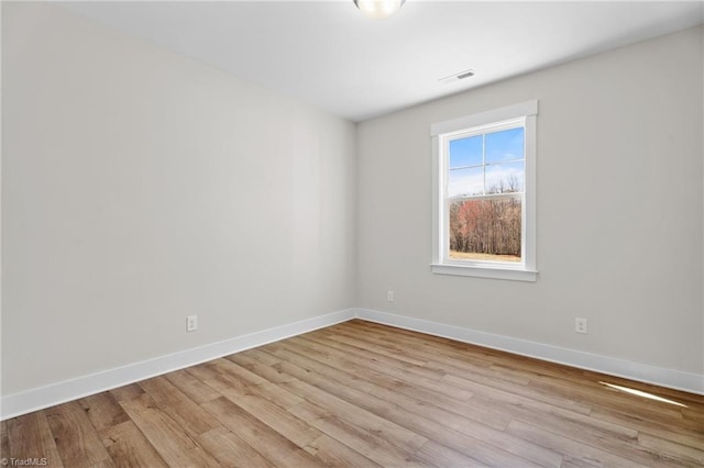 271 Redland Rd, Advance, NC 27006 - spare room featuring wood finished floors