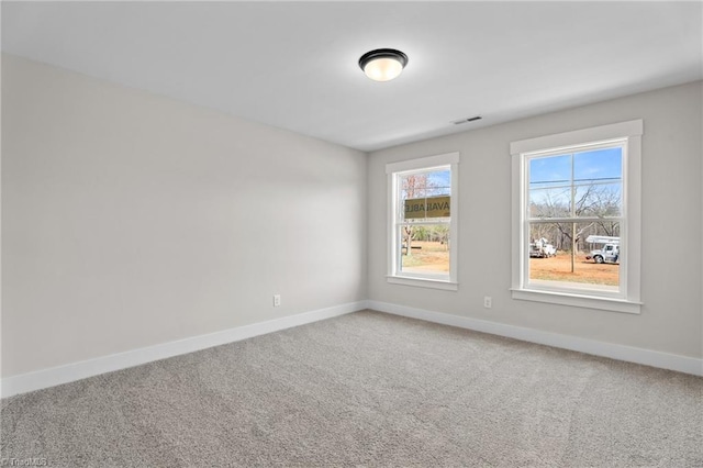 271 Redland Rd, Advance, NC 27006 - carpeted spare room with baseboards