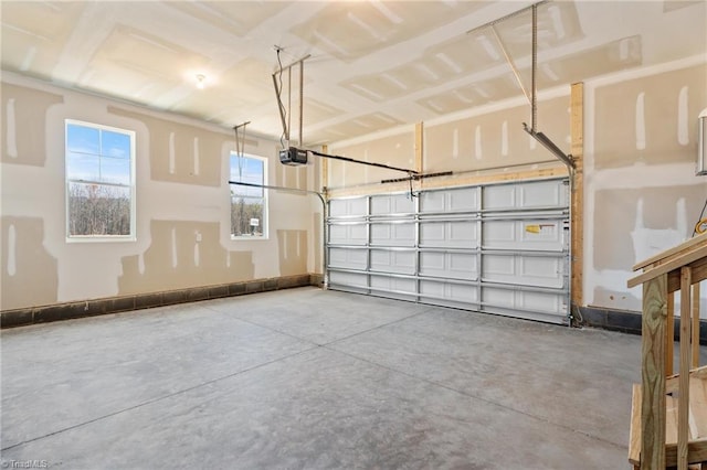 271 Redland Rd, Advance, NC 27006 - garage featuring a garage door opener