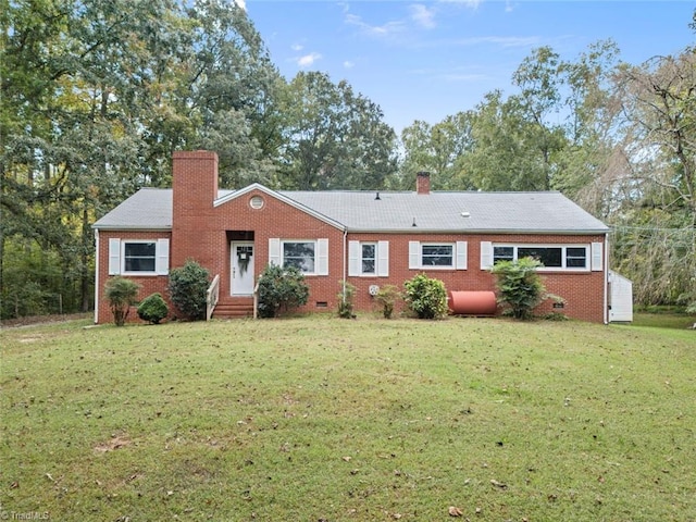 ranch-style home featuring a front lawn