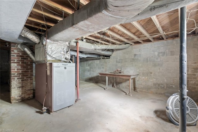 basement featuring heating unit