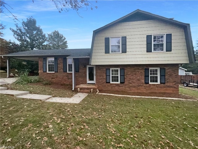 tri-level home featuring a front yard