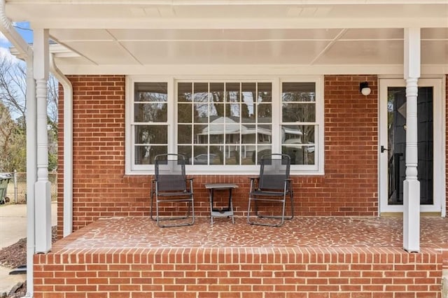 view of patio featuring a porch